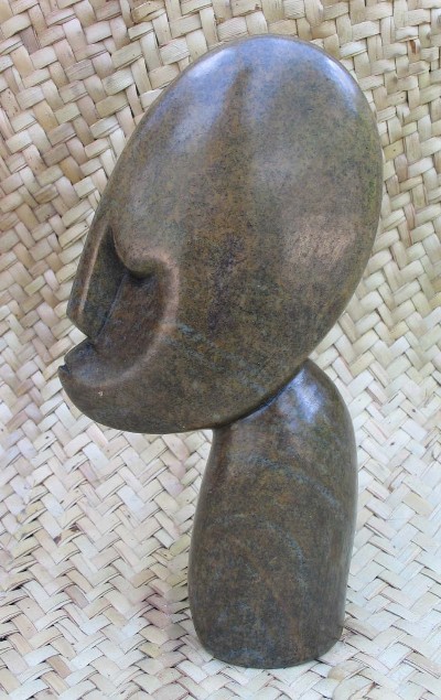 Gallery Shona Serpentine "Resting Man" Sculpture